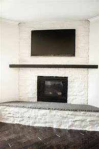 Image result for Black Wall with German Schmear Fireplace