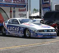 Image result for Pro Stock Drag Next to Street Car