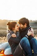 Image result for Couple Sitting Embracing Photo