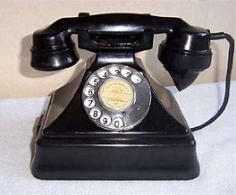 Image result for Mitsubishi Flip Phone Pre-1960