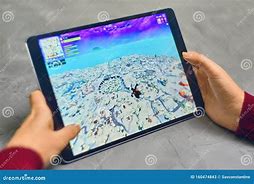 Image result for Man Playing Fortnite On iPad