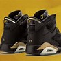 Image result for Black and Gold 6s Pack 11s