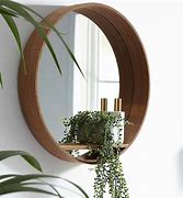 Image result for round wooden framed mirrors with shelves