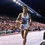 Image result for A Male Athlete Winning Race