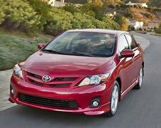 Image result for 2011 toyota corolla maroon color