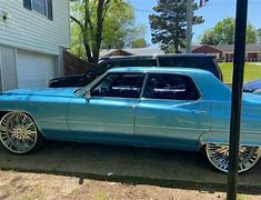 Image result for Chrome Cadillac DeVille