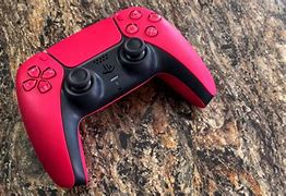 Image result for Dual Sense Cosmic Red Wireless Controller