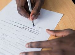 Image result for Signing a Document