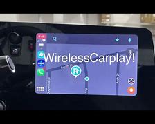 Image result for iPhone Car Wireless Charger for C8 Corvette