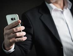 Image result for Person Holding a Phone