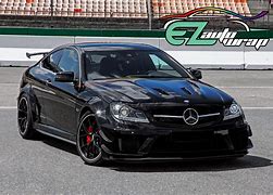 Image result for Black Gloss Vinyl Wrap Car