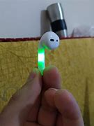Image result for AirPods Green Light