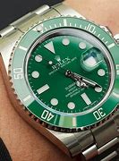 Image result for Rolex Submariner Green Gold