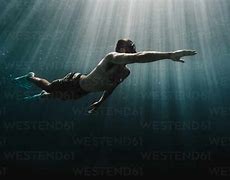 Image result for Man Swimming in Ocean Waves