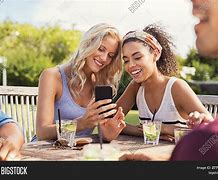 Image result for On the Phone 2 People Smiling