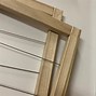Image result for Wall Mounted Woodern Cloths Rail Strikes Folding