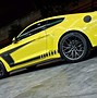 Image result for black mustang with  yellow stripes