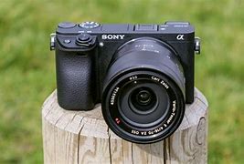Image result for Sony R V Mirrorless Camera Bundle