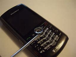 Image result for BlackBerry Trackball Phone Silver
