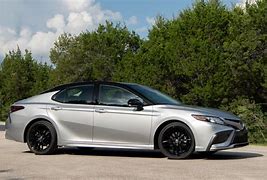 Image result for Toyota Camry XSE Red in Front of a Apartment