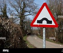 Image result for Slow Down Humpback Bridge Sign