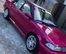 Image result for Burnt Red On Toyota Corolla