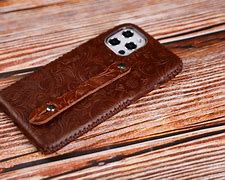 Image result for iPhone Leather Case in Hand