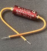 Image result for Maroon Capacitor