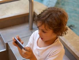 Image result for Kids with Ipone