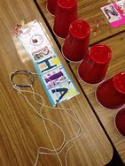 Image result for Rubber Band Cup Stack Game