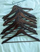 Image result for Dark Wood Clothes Hangers