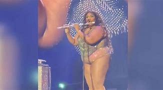 Image result for Lizzo Playing James Madison Flute