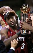 Image result for Dwyane Wade with Championship Trophy