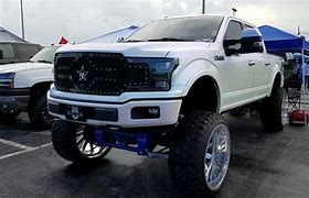 Image result for Lifted Trucks with Big Rims