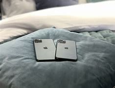 Image result for White iPhone 11 On a Bed