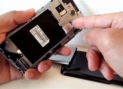 Image result for Pictures of the Back of a Phone for a Sim Card