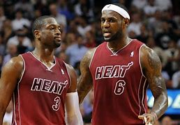 Image result for Miami Heat Photo of the Year LeBron and Dyane Wade