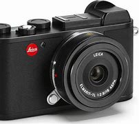 Image result for Smallest APS-C Camera
