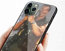Image result for Arnold iPhone 11 Pro Wepon