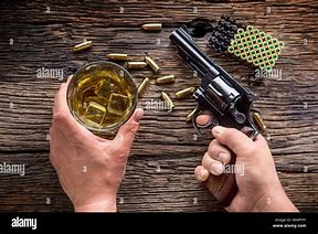 Image result for Gun and Liquor On Coffee Table