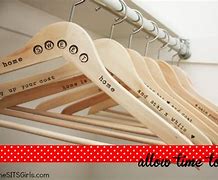 Image result for Curved Wooden Hangers