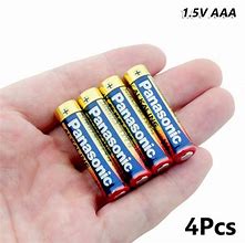 Image result for How to Put in AAA Batteries