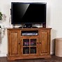Image result for 65 Inch TV On Electric Fire Place Stand