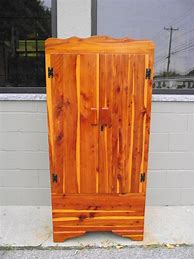 Image result for Cedar Wardrobe Closet with Bottom Drawer
