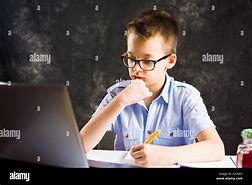 Image result for Boy Doing Homework with Computer