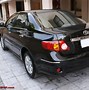 Image result for Toyota Corolla Altis Black