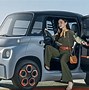 Image result for Two-Door Electric Car