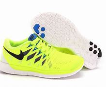 Image result for Nike Orange Free Run Running Shoes