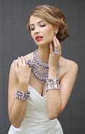 Image result for Image of Television Ads Depicting Japanese Women Wear Jewelry From Coin Business