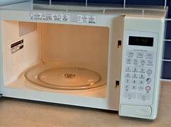 Image result for GE Turntable Microwave